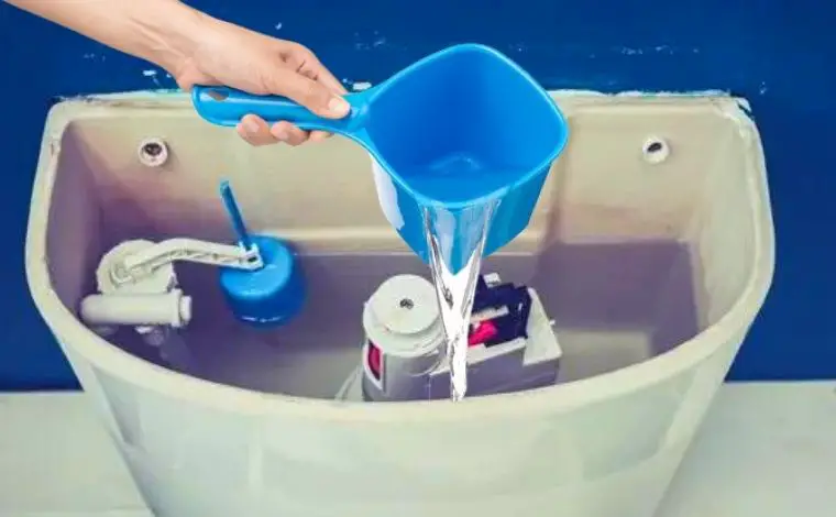 Pouring water into the water tank
