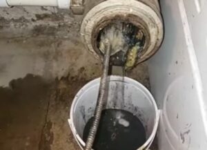 A clogged drainpipe