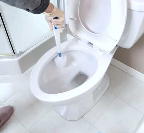 Clean the interior of the toilet