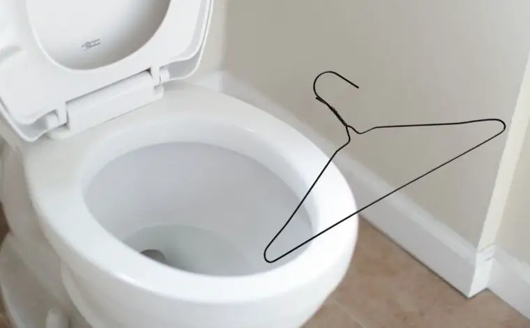 How do you unclog a toilet with a wire?