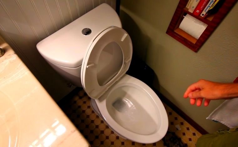 Do high efficiency toilets have less water in the bowl?