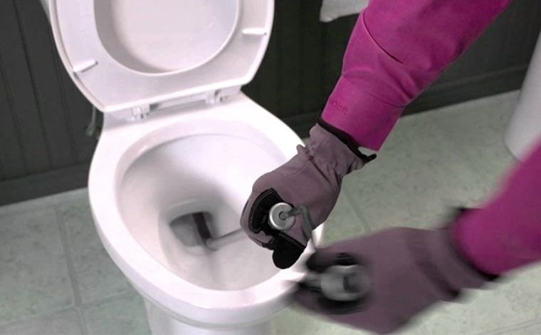 How do you unclog an energy efficient toilet?